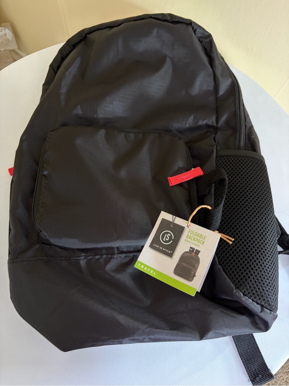Foldable Black Travel Backpack with Red Accent